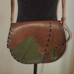 Elegant Brown Leather Crossbody Bag with Green Leaf Design